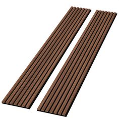 two brown wooden sticks sitting next to each other