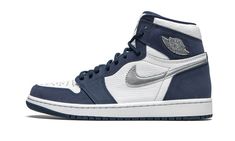 The Air Jordan 1 High Co. Jp “Midnight Navy” is one of several exclusive colorways that originally appeared in Nike’s celebrated “Concept Japan” series that returned as a global release in 2020.  The “Midnight Navy” was one of the first Jordan 1s to feature a navy color scheme when it did so all the way back in 2001.  As it was back then, the colorway remains fresh and versatile today.  The upper displays a white leather construction on the perforated toe, mid-panel, and collar.  Contrasting Mid Navy Color Scheme, Exclusive Sneakers, Jordan 1s, Jordan 1 High Og, Jordan Sneakers, Air Jordan 1 Retro High Og, Nike Dunk High, Air Jordan 1 Retro High, Nike Shox