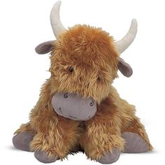 a brown stuffed animal with horns sitting down