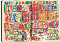 an open notebook with colored crayons on the pages and writing in it,