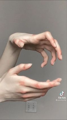 two hands reaching out towards each other