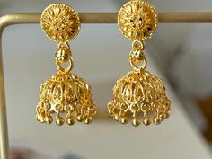 gold plated jhumki earrings with post, Indian style  earrings. Cutest micro jhumka you've ever seen.  Earrings dangle 1.25 inches long and are super light. perfect for everyday wear.  These beauties are for pierced ears, they are not clip on style. Gold Small Jhumka Earrings, Gold Plated Dangle Jhumkas With Latkans, Gold Bollywood Dangle Jhumkas, Gold Bollywood Style Dangle Jhumkas, Gold Plated Jhumkas With Latkans, Bollywood Style Gold Dangle Jhumkas, Traditional Gold Clip-on Earrings For Festivals, Gold Drop Latkans Clip-on Earrings, Festive Pierced Jhumkas Drop Earrings