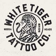 the white tiger tattoo co logo is shown in black and white, with an image of a