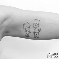 the simpsons family tattoo on the arm