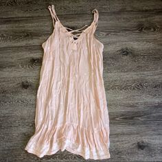 Pacsun Kendall And Kylie Light Pink Dress With White Little Flowers Never Worn Beachy Sundress For Spring Beach Cover-up, Casual Peach Midi Dress For Summer, Peach Casual Midi Dress For Summer, Beachy Sundress In Mini Length For Spring, Casual Peach Summer Dress, Beachy Sundress For Spring Brunch, Flowy Peach Dress For The Beach, Spring Peach Sundress For The Beach, Spring Peach Sundress For Beach