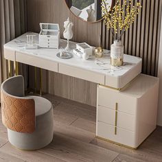 a white desk topped with a mirror and a vase filled with flowers