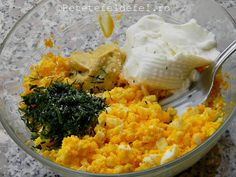 a glass bowl filled with different types of food