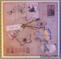 a close up of a card with butterflies on it and thank you written on the back