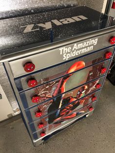 the amazing spiderman dresser is on display