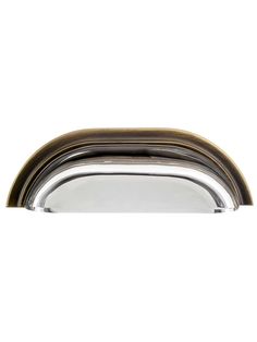 an oval metal handle on a white background