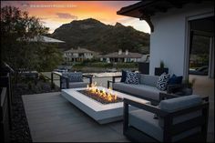 a fire pit sitting on top of a patio