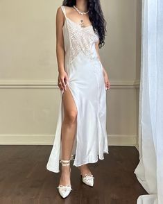 - Victoria's Secret ethereal satin maxi slip dress in pearl white featuring intricate lace embroidery bodice with knee split hem- vintage; adjustable straps; semi sheer lace- size M- lovely condition, slight fabric indentation (as shown in picture) but not noticeable unless closely inspected 🤍Model Measurements:- Bust: 34B- Waist: 26- Hip: 38- Height: 5"4 🤍 Size of mannequin: size 2 - 4 Lace Slip Dress Outfit, Slip Dress Outfit, Lace Slip Dress, Maxi Slip Dress, Satin Maxi, Lace Slip, White Maxi, Lace Embroidery, Split Hem