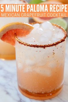 the mexican grapefruit cocktail is garnished with an orange slice and sugar