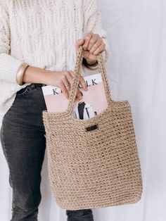 Casual, minimalistic bag with 100% natural jute twine. The bag is comfortable and practical, ideal for work, walks, the beach, for shopping.  It is ecological and natural, and will last a long time. * Minimalistic handbag. * Easy to care for. * Perfect for summer, autumn, winter and spring * Super strong  Perfect gift idea for her. Size : Height: 36cm (14,1 inches) Width 34cm (13.3 inches) Height with handles: 55 cm (21.6 inches) For the reason it is handmade, there might be a measurement differ Lightweight Eco-friendly Crochet Tote Bag, Eco-friendly Lightweight Crochet Tote Bag, Lightweight Everyday Jute Bag, Everyday Lightweight Jute Bag, Lightweight Jute Bag In Natural Color, Natural Fiber Straw Bag For Everyday Use, Lightweight Natural Crochet Bag For Daily Use, Lightweight Natural Jute Bag, Casual Jute Crochet Bag For Daily Use