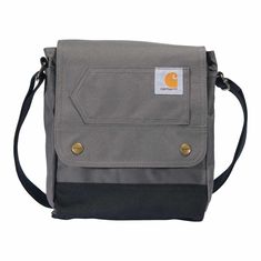 This cross-body bag gives you rugged storage for your day-to-day necessities. The large main compartment has smaller pockets to keep your gear in line, and it's spacious enough to hold a book or tablet. This bag is made with water-repellent material, so your things stay dry through light rain.Features600 denier polyester with Rain Defender® durable water repellentDimensions: 9" X 11" X 2.5"Large main compartment with flap over snap closureFour interior pocketsAdjustable cross body shoulder strap Snap Bag, Carhartt Womens, Water Repellent Fabric, Waist Pack, Flap Bag, Snap Closure, Water Repellent, Inside Pocket, Workout Shirts