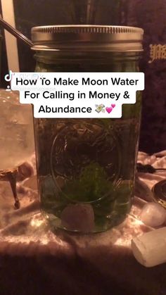 a jar filled with water sitting on top of a table