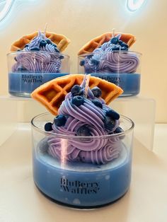 blueberry waffles are sitting in a glass bowl