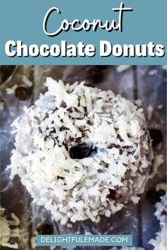 a chocolate donut covered in coconut flakes