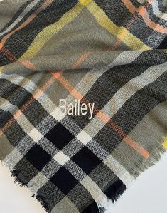 Handmade, custom, personalized, unique scarf by ITB Design. Follow us for our fashion and style tips on how to wear and tie scarves for any season. Check out the scarves and be inspired. Oversized, ultra soft, multicolored tartan plaid blanket scarf. Stylish, chic with fringed ends. Perfect for keeping warm in fall/winter months, great for ball games and showing school colors. IN CASE YOU CHOOSE TO PERSONALIZE YOUR SCARF, follow the next steps: IN THE NOTES BOX AT CHECKOUT: 1) Please list your letters in the order you want your monogram. Your order will be monogrammed in the order in which you list your letters. A personalization guide can be found in the listing pictures. 2) List your monogram font. A guide with all the fonts can be found in the pictures. 3) Thread Color. A guide with all Winter Bridesmaid, Tie Scarves, Winter Bridesmaids, Unique Scarf, Plaid Shawl, Bridesmaid Shawl, Ball Games, Plaid Blanket Scarf, Plaid Blanket