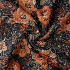 an orange and black floral print fabric