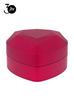 a pink box with the lid open and it's lid covered in an octagonal shape