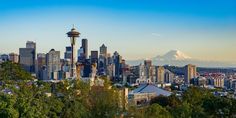 the seattle skyline with mt rainier in the background