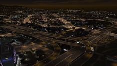 an aerial view of a city at night