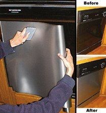 a person is cleaning a dishwasher in the kitchen and then removing it with a cloth