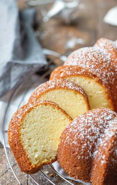 a bundt cake on a wire rack with powdered sugar