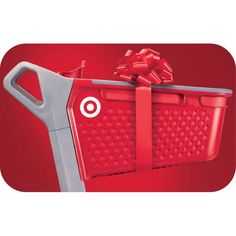 a red shopping basket with a bow on it