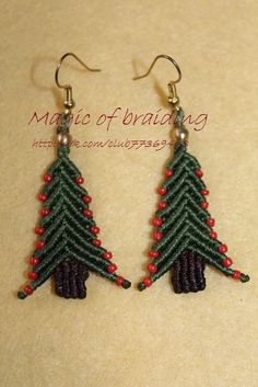 the beaded christmas tree earrings are on display