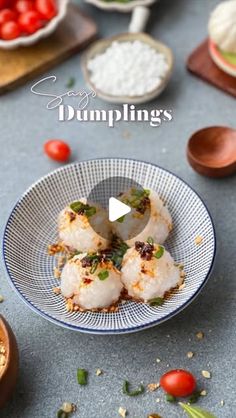 the video shows how to make dumplings with vegetables and seasonings in small bowls