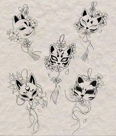 four masks with flowers on them and one has an animal face in the middle, while another