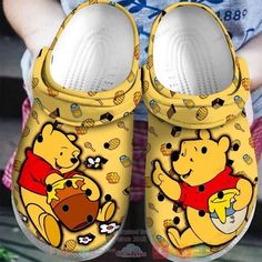 Introducing our adorable Winnie The Pooh Clogs Shoes Gift! Made with love, these charming clogs feature vibrant colors and delightful Pooh Bear Characters, Comfy Footwear, Crocband Clog, Rubber Clogs, Cute Winnie The Pooh, Versatile Shoes, Crocs Crocband, Disney Gift, Crocs Clogs