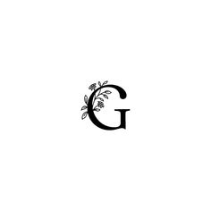 the letter g is made up of leaves and flowers on it's side,