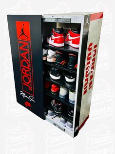 a display case with several pairs of shoes in it and the words jordan written on the side