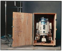 a star wars r2d - d2 in a wooden box