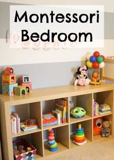 a child's playroom with toys and decorations on the wall, including bookshelves