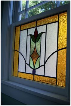 a close up of a stained glass window