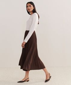 Pleated Skirt Chocolate Dressed up or down with ease, this pleated matte skirt is perfect for any occasion. With an easy, ultra-flattering drape, this piece is meant for styling with varied silhouettes: pair it with a relaxed knit or turtleneck for an elevated look or a slim-fit tee for more casual styling. | Jenni Kayne Women's Pleated Skirt Size 2X-Large Fall Flowy Midi Skirt Dresses, Flowy Midi Skirt Dress For Fall, Fall Dresses With Pleated Relaxed Skirt, Chic Accordion Pleated Flowy Skirt, Flowy Tiered Skirt With Accordion Pleats, Chic Maxi Skirt With Accordion Pleats In Relaxed Fit, Relaxed Full Skirt Dresses For Fall, Flowy Lined Skirt Dress For Fall, Fall Dresses With Relaxed Full Skirt