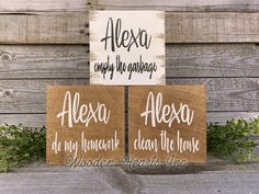 two wooden signs with words on them