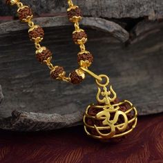 This Pendant Necklaces item by OmkarJewel has 75 favorites from Etsy shoppers. Ships from India. Listed on Jan 31, 2024 Trishul Design, Rudraksha Pendant, 5 Mukhi Rudraksha, Rudraksha Jewelry, Wedding Jewelry Sets Bridal Jewellery, Pendant Designs, Rudraksha Mala, Mens Gold Jewelry, Gold Fashion Necklace