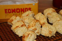 biscuits on a cooling rack next to an empty box