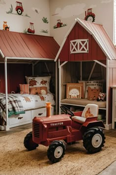 a child's bedroom with a red tractor bed