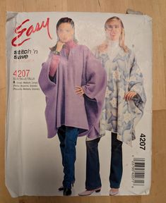 two women in purple coats standing next to each other on the cover of a sewing pattern