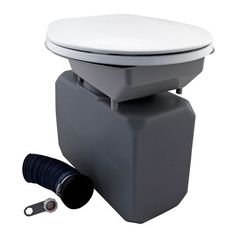 a gray and white toilet sitting on top of a table