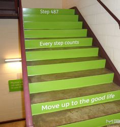 the steps are painted green and have signs on them that read every step counts move up to the good life