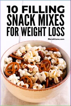 These DIY snack mixes are loaded with healthy fats, antioxidants, protein and fibre to keep you satisfied and help you lose weight. Low Cal Trail Mix Recipes, Low Calorie Snack Mix Recipes, Low Cal Movie Snacks, Diy Sargento Balanced Breaks, Healthy Snack Mix Recipes Clean Eating, Healthy Snack Mix Recipes Low Carb, Low Calorie Trail Mix Recipes Healthy, Low Cal Filling Snacks, Low Calorie High Volume Snacks