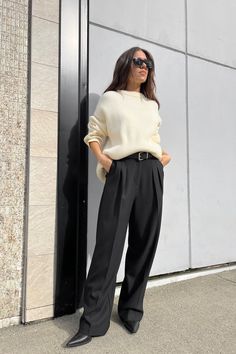 These wide leg trousers are made in a relaxed fit and has a high-rise waist. It has double pleats at the front and side pockets. A wardrobe staple to wear year after year, style yours with a ribbed sweater and boots.DETAILSRelaxed fit. Wide leg cut. High-rise waist. Model is 5'7" and is wearing a size 4. Black Wide Trousers Outfit, Wide Pants Outfit Winter, Wide Leg Pants Street Style, Wide Trousers Outfit, Trousers Outfit Work, Black Wide Leg Pants Outfit, Wide Leg Pants Outfit Work, Pleated Pants Outfit, Black Trousers Outfit