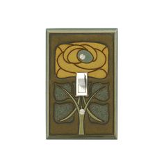 a light switch cover with a flower design on it